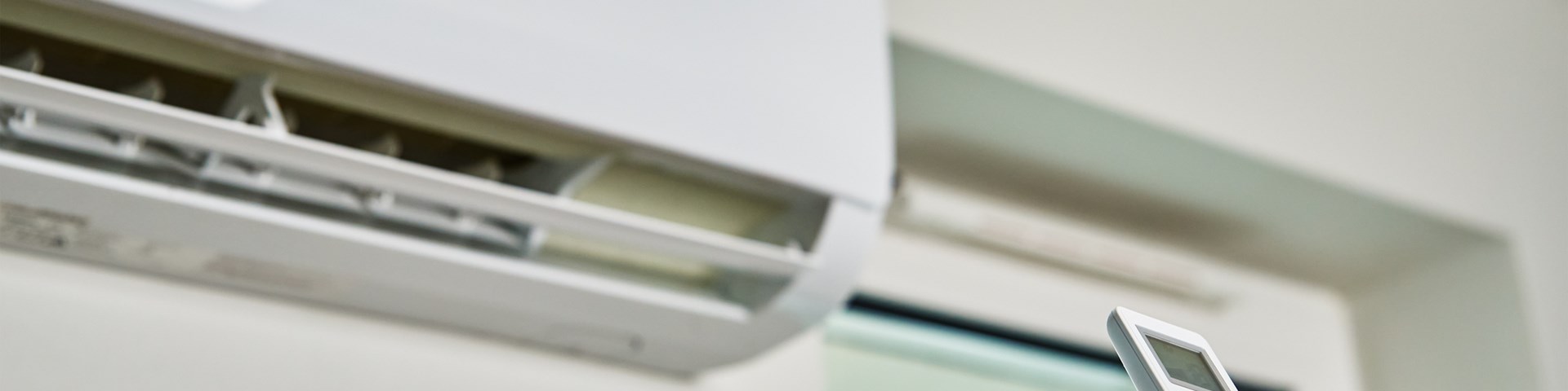Remote control changing air conditioning unit temperature 